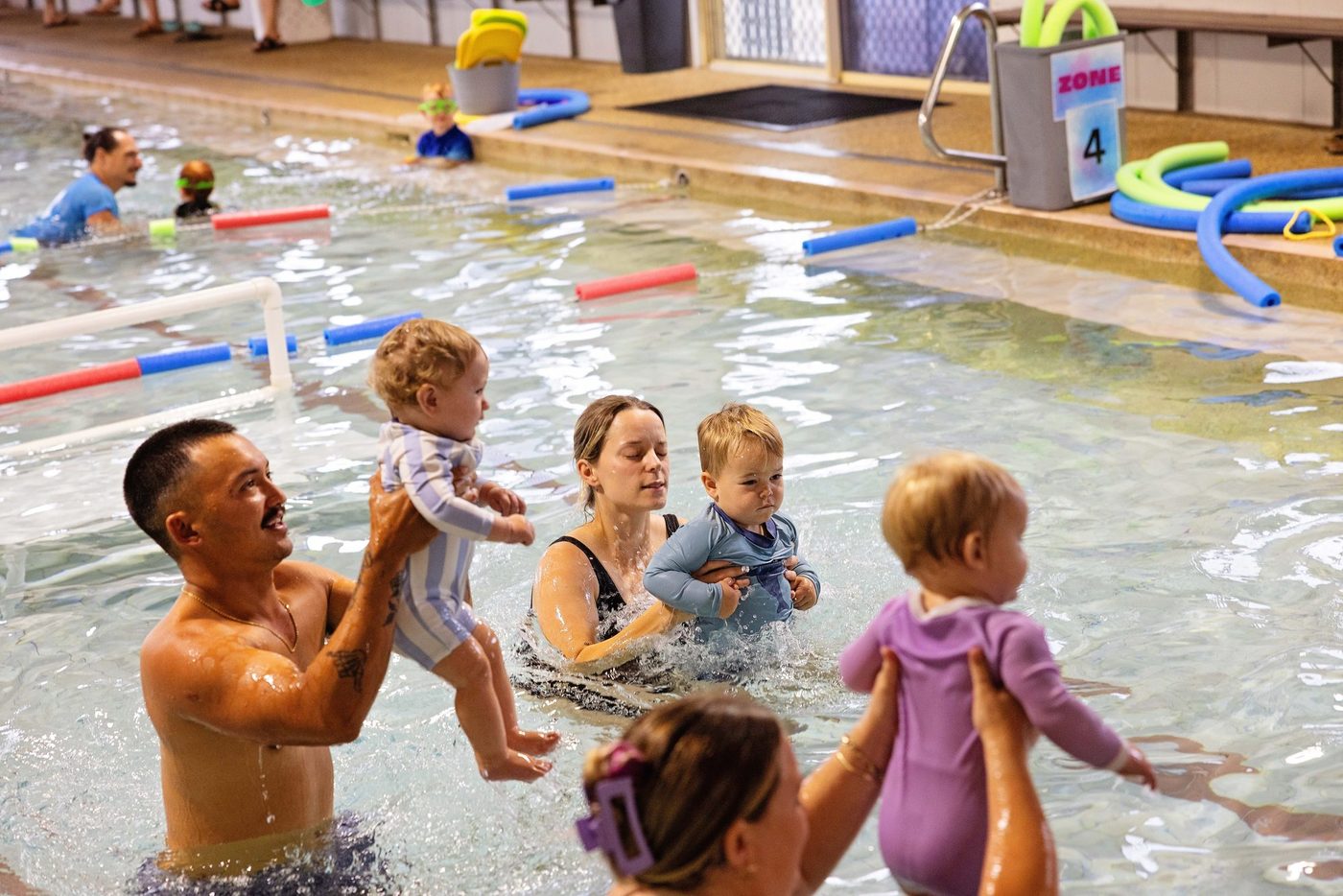 Parent and baby in a Marlins swimming lesson